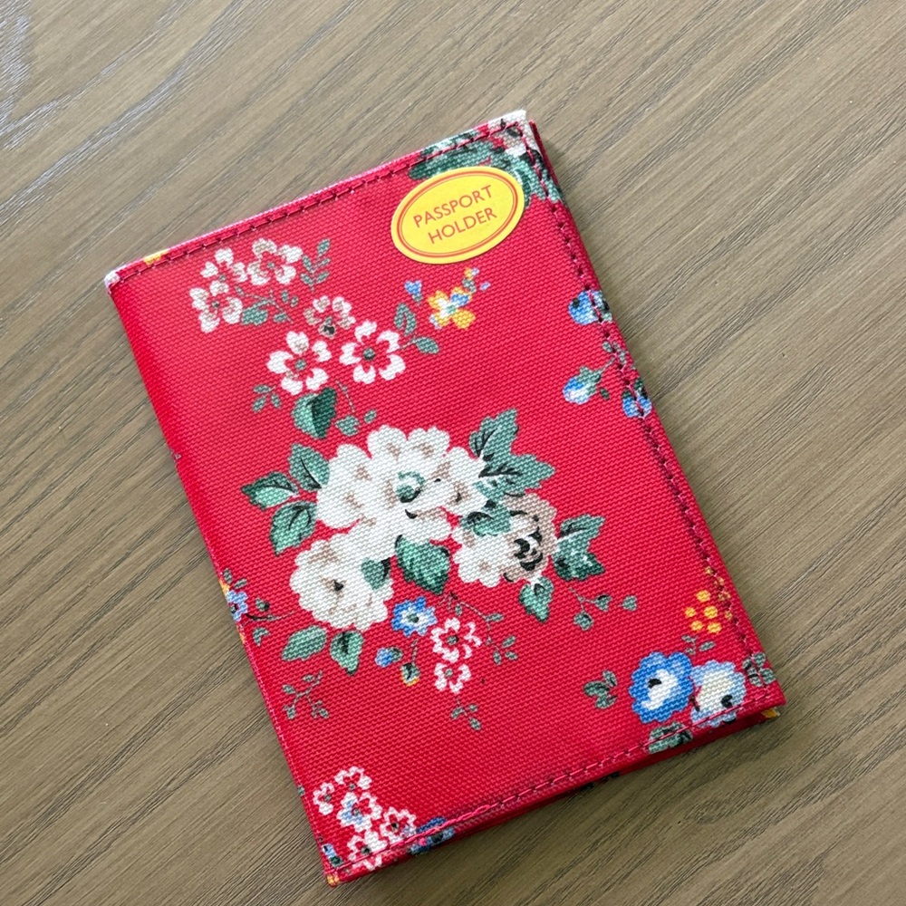 new red floral Cath Kidston passport holder